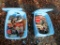 (2) Blue totes full of mower parts
