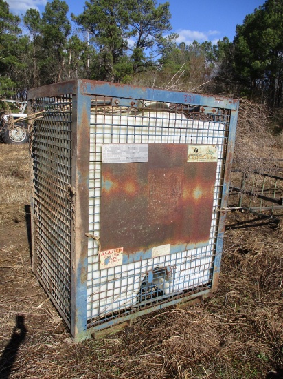330 Gal Poly Tank in metal cage/ ladder rack