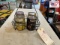 4 Vintage Oil cans with metal rack