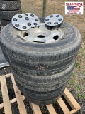 Set of 4 Chevrolet wheels with used tires