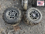 Set of 4 Polaris wheels and tires (3 center caps)