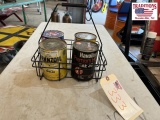 4 Vintage Oil cans with metal rack