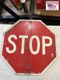 STOP sign with SLOW on reverse side