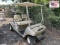 Tan Club Car Golf Cart