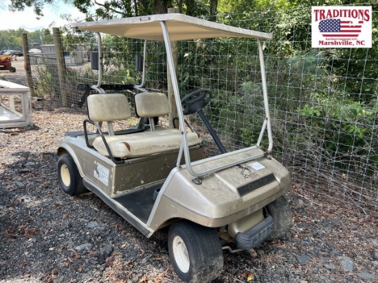 Tan Club Car Golf Cart