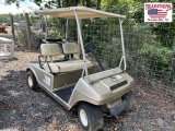 Tan Club Car Golf Cart