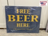 Free Beer Here Metal Sign
