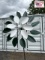 Green and White Flower Whirligig