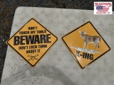 Deer crossing & don’t touch my tools Signs