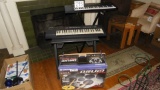2 keyboards and stands