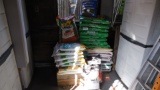 ~29 bags of soil, bag of Preen lawn weed control and ~3 bags of ice melt