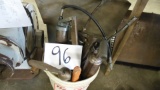 Bucket of grease guns