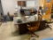 LOT OF OFFICE FURNITURE: couch, credenza, desk, books, golf clubs, suitcases (does not include any