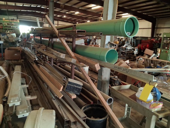 LOT OF RAW MATERIAL. w/ rolling fabricated rack, approx. 15'L. x 6' ht. x 11" arms, raw material c/o