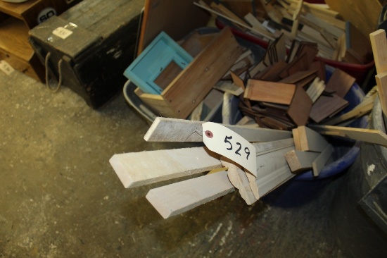 Two bins of wood scraps