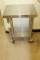Stainless Table on castors 24 X 18 X 34