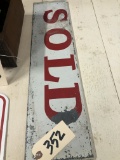TWO SOLD SIGNS