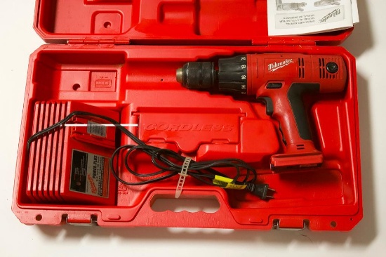 Milwaukee Drill and Charger. Needs battery