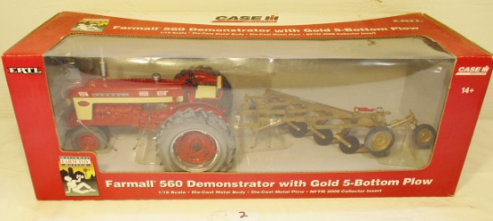 Farmall 560 with gold plow