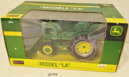 JD LA tractor with snow blade