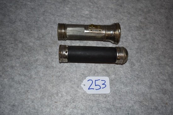 Pair of Winchester 2-Cell Flashlights – 1st is in Corrugated Fiber Case – 2nd is in Nickel Plated Ca