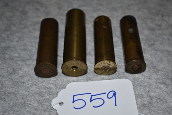 Grouping of 4 Shells – 1st is Winchester 20ga. Brass Shot Shell – 2nd is WRA 10ga. Rival Brass Shot