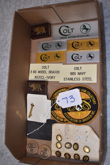 Lot of 16 Various Colt Collector Items – Incl. Patches, Pins, Badges, Advertising Labels & Colt Elep