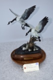 Bronze – “Upstream and Down” of Two Landing Canadian Geese on Water w/Swimming Canadian & Two Goslin