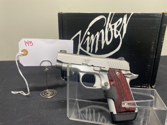 KIMBER MICRO 9 9MM WITH LASER GRIPS SN#PB0120692