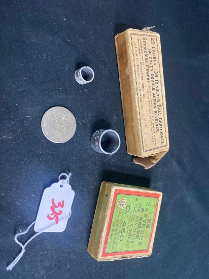 WINCHESTER SHOOTING COIN AND WINCHESTER 38 COLT EMPTY AND FIOCCHI EMPTY BOX (X1)