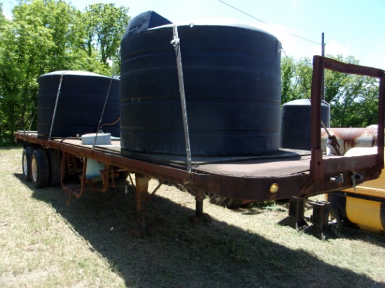 Fruehauf Flat Bed Trailer w/2 apx 1200 gal Poly Tanks & Pump