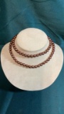 COPPER COLORED STRING OF PEARLS