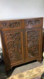 HEAVILY CARVED ROSEWOOD ASIAN ARMOIRE