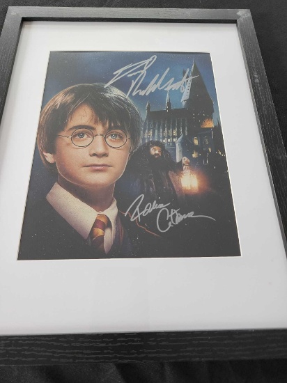Harry Potter cast signed photo autographed by Daniel Radcliffe and Robbie Coltrane. 8x10 inches-