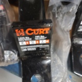 Skid of Curt Hitches