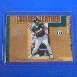 2005 DONRUSS LEATHER LUMBER RICKEY HENDERSON LEATHER AND LUMBER #D 1698/2000 A'S