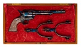 Custom engraved and Cased Silver Mounted Colt Model 1873 Revolver With Spurs