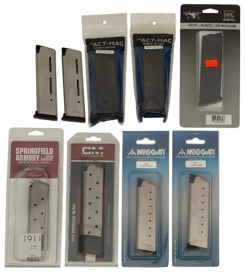 A Grouping of 9 .45 Caliber Pistol Magazines