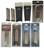 A Grouping of 9 .45 Caliber Pistol Magazines