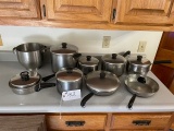 9 psc. Misc. Cookware with lids,1 strainer