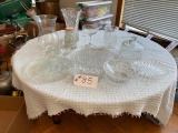Box of clear plates, bowl, butter dish, vases, jar of decorating stones