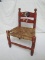 VINTAGE SMALL CHILDS WOVEN RED CHAIR
