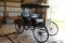 2 SEAT SURREY BUGGY, CANAPY, WOOD WHEELS, (4) COLLARS, HARNESS, OLDER RESTORATION, STORED INSIDE