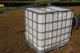 (2) APPROX 200 GALLON POLY TANKS IN CAGES,