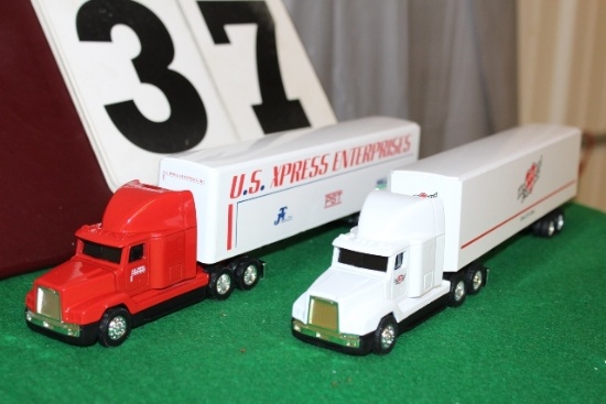 (2) 1/64 FREIGHTLINER SEMIS WITH TRAILERS,