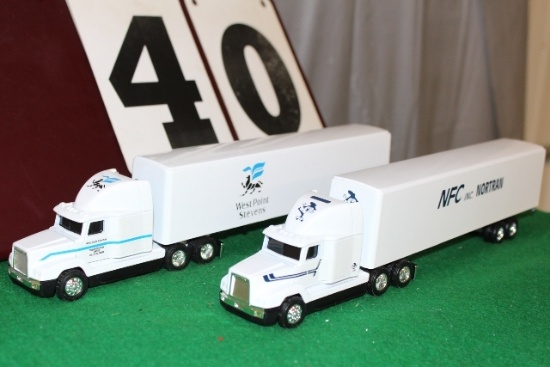 (2) 1/64 FREIGHTLINER SEMIS WITH TRAILERS,