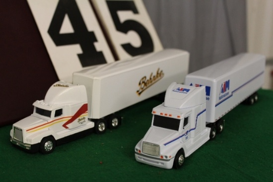 (2) 1/64 FREIGHTLINER SEMIS WITH TRAILERS,