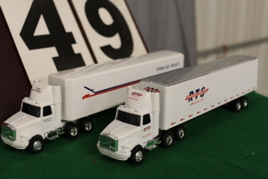 (2) 1/64 WHITEGMC SEMIS WITH TRAILERS.