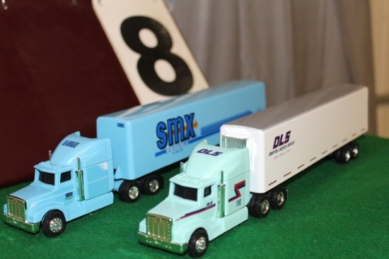 (2) 1/64 PETERBILT SEMIS WITH TRAILERS,