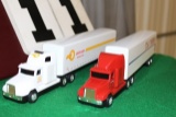 (2) 1/64 FREIGHTLINER SEMIS WITH TRAILERS,